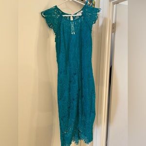 Teal, form fitting, Lacey, mid length, sleeveless dress